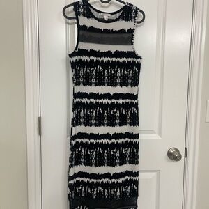 Cool sleeveless dress! Bought it in Europe and wore it once.